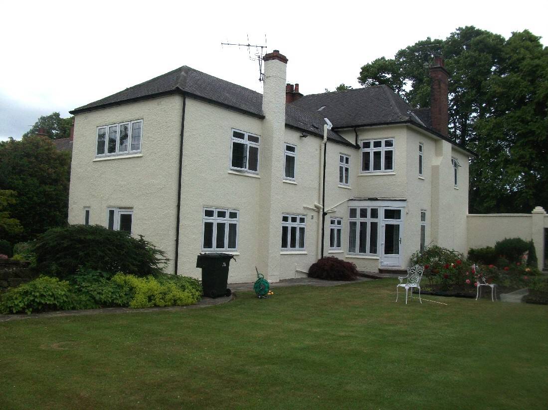 painted roughcast house after wall coatings