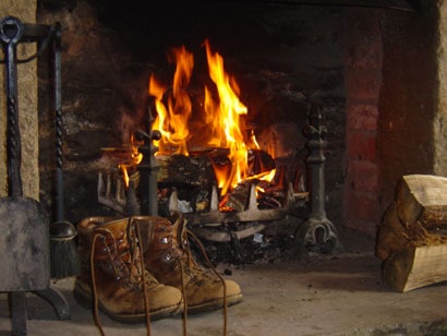 cosy by the fire after having an insulated wall coating