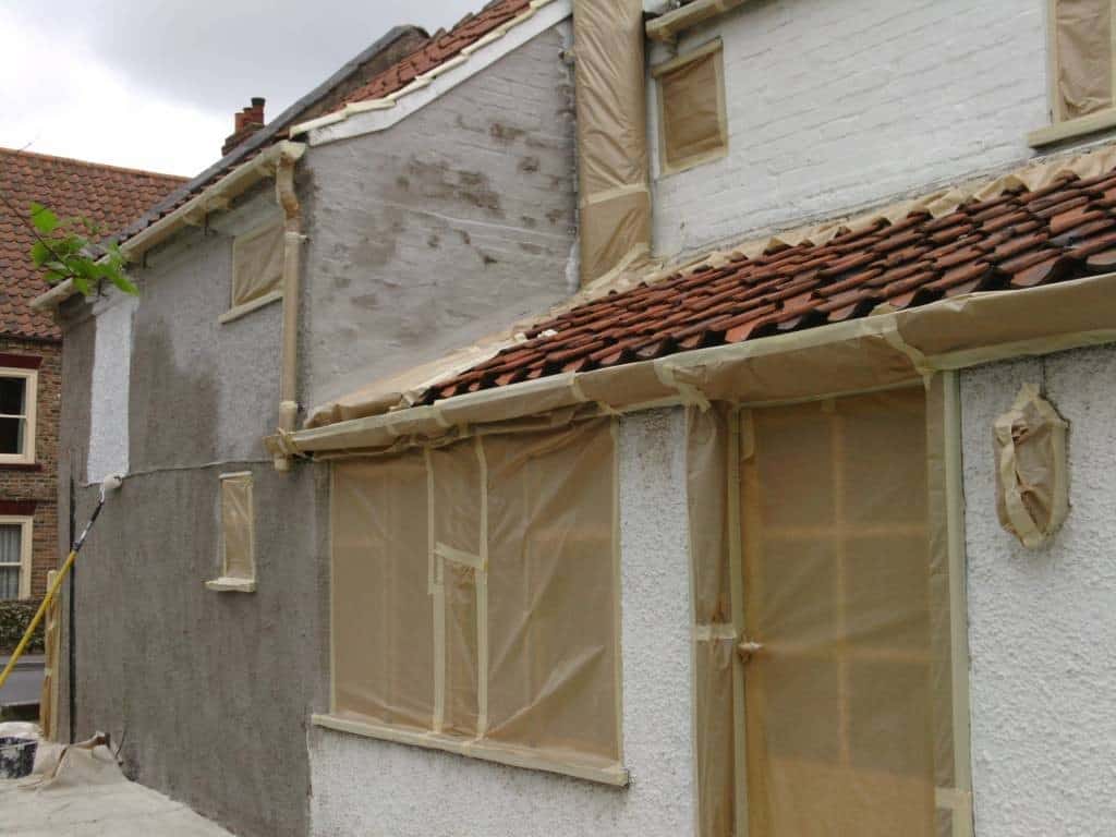Masking a house cheap for spray painting
